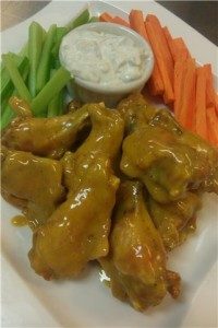 Buffalo wings with a honey mustard sauce