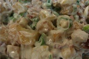 Deep fried potato salad with crispy bacon and a blue cheese dressing